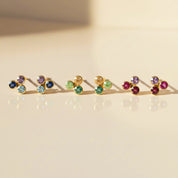 Cluster birthstone bar stud earrings displayed in a full lineup showcasing all twelve birthstone colors, featuring dainty bezel-set gemstones in .925 sterling silver or 18k gold vermeil. Minimalist multi-stone studs perfect for everyday wear, Mother’s Day gifts, bridesmaid jewelry, or personalized birthday gifts for mom or daughter. Elegant, colorful gemstone earring design ideal for meaningful keepsake gifting.