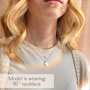 Subtle astrology necklace with engraved constellation disc on gold filled chain, ideal everyday layered necklace. Features Sagittarius (November–December) and Capricorn (December–January) sign ideas, with back-side personalization—names, coordinates, or dates. Handcrafted in the USA in sterling silver, gold filled, or rose gold; adjustable lengths; elegant constellation pendant for birthdays, New Year gifts, or meaningful winter holiday jewelry.