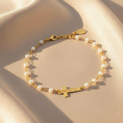 Custom engraved cross bracelet in 14K gold filled chain with personalized name-plate; dainty women’s faith jewelry gift for mom, daughter, or best friend.