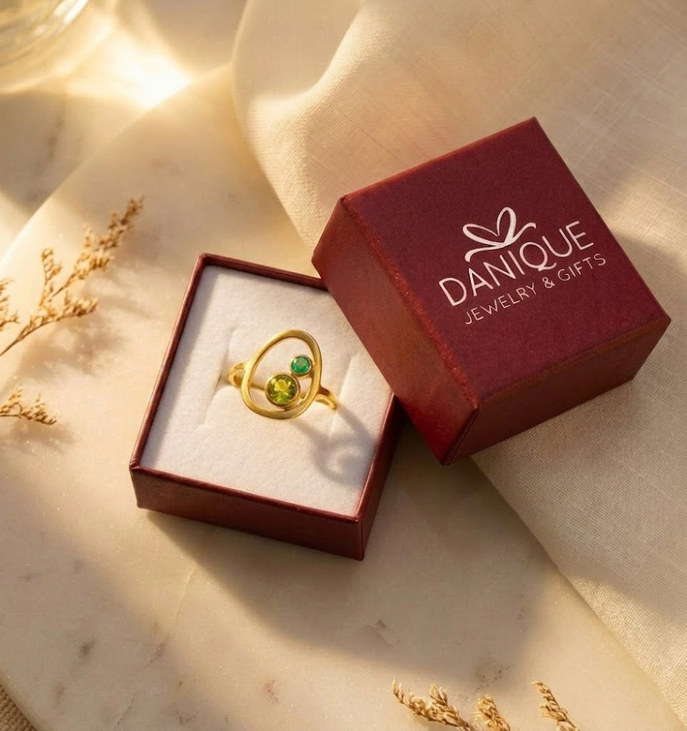 Custom mother child birthstone ring in Danique Jewelry gift box ready for gifting.