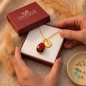Gift ready personalized birthstone initial necklace in Danique jewelry box