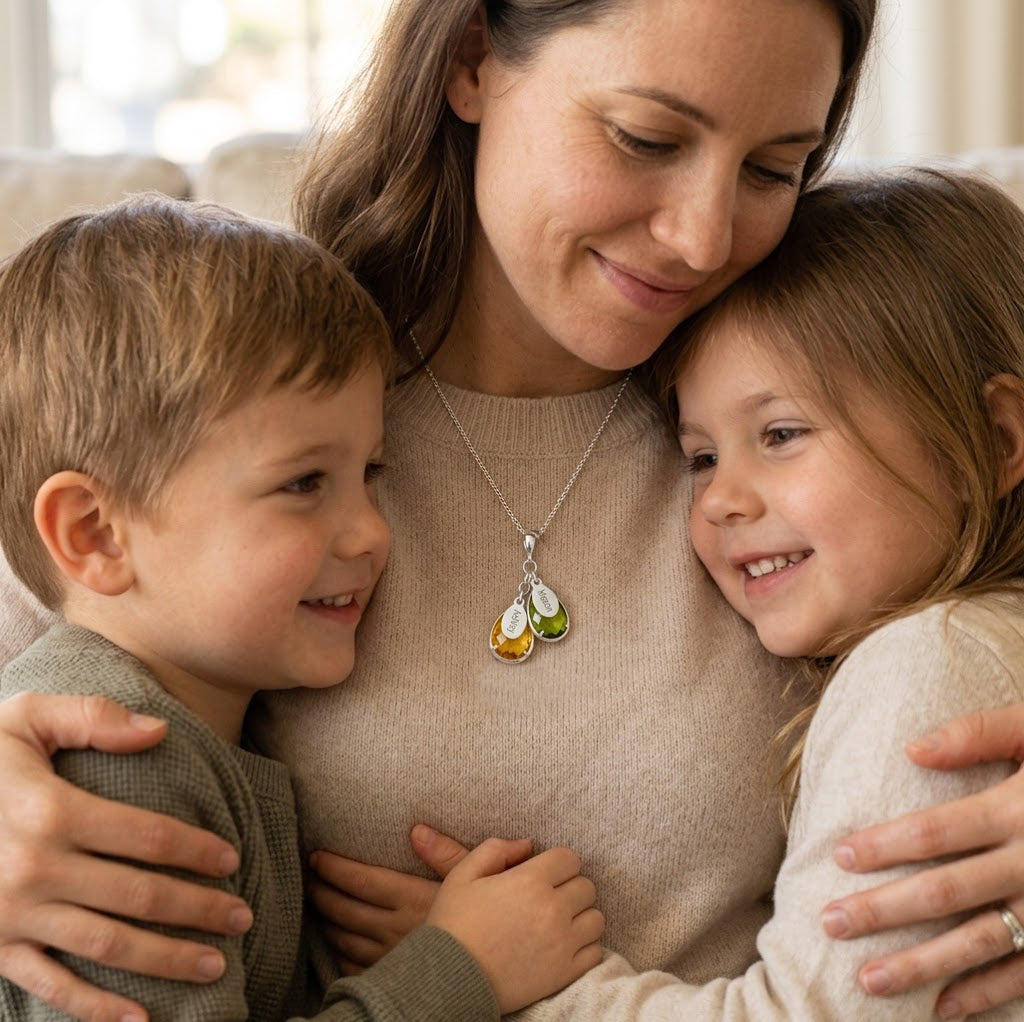 Custom birthstone necklace for mom featuring cascading teardrop gemstones with engraved name tags, personalized family jewelry in gold or sterling silver, perfect meaningful gift for Mother’s Day or grandma