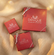 Gold bangle bracelet with dangling birthstone charms and engraved initial tags personalized jewelry