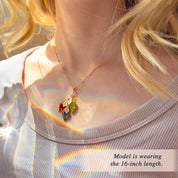 Model wearing personalized birthstone and name necklace for mom with colorful gemstone charms and engraved tags on a 16 inch gold filled chain, custom family birthstone necklace gift for mother