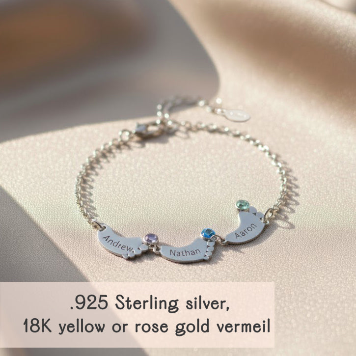Sterling silver personalized footprint bracelet with up to six engraved footprint charms and matching birthstones, custom family bracelet perfect for moms of several children or a thoughtful grandma gift.