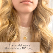 A model wearing a gold engraved footprint necklace. mother bereavement gift, grieving mom gift, sympathy gift, remembrance gift, keepsake, lasting connections jewelry, mothers day gift