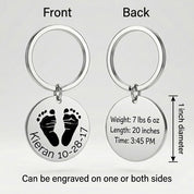 Personalized baby footprint keychain showing front and back engraving options, including an actual baby footprint on one side and custom text on the other. This engraved baby footprint keychain is crafted from stainless steel and designed for everyday wear, making it a meaningful keepsake gift for moms and grandmas who want to carry a baby’s memory wherever they go.