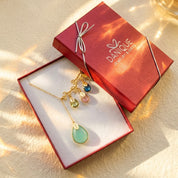 Gift boxed custom birthstone and engraved name charm necklace for mom with aqua teardrop pendant