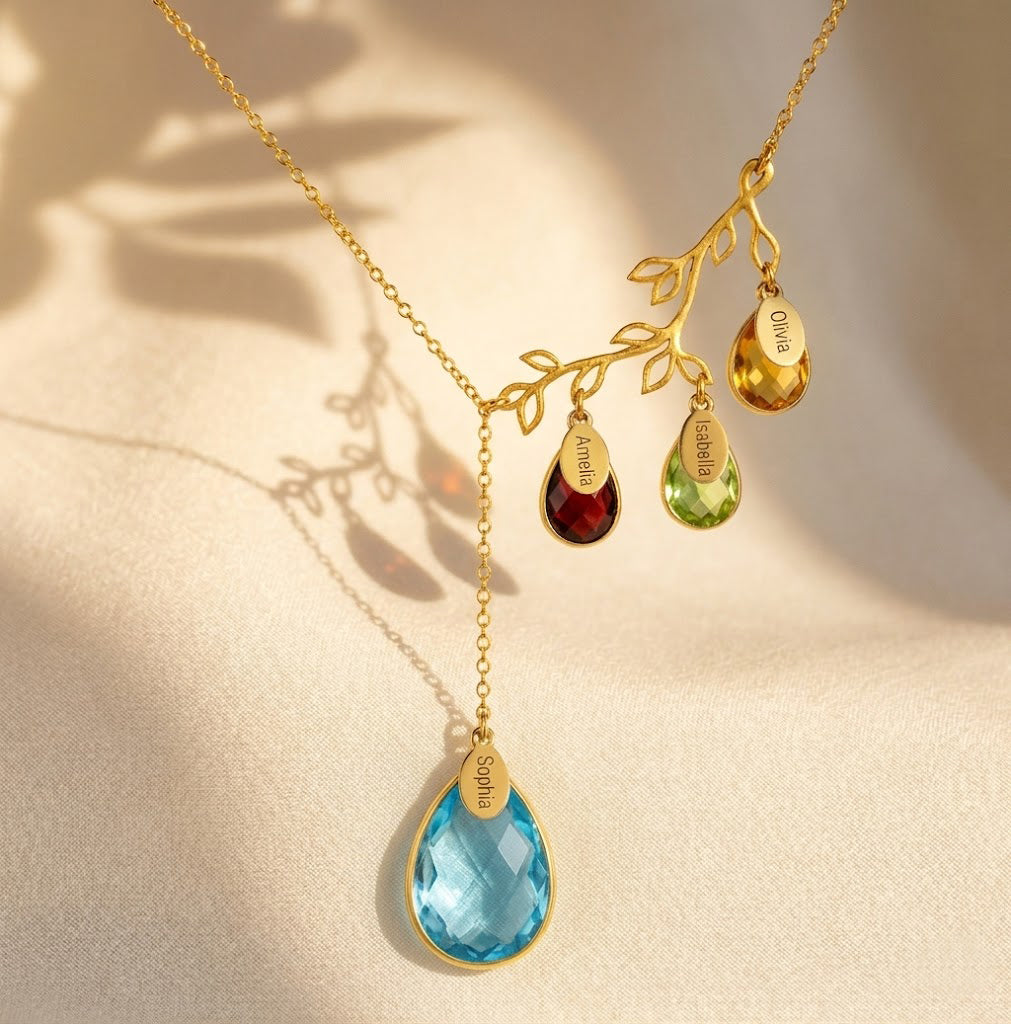 Gold filled family tree branch with 1 large aqua chalcedony stone and three children birthstones including pink chalcedony, kyanite and moonstone all with engraved oval name tags