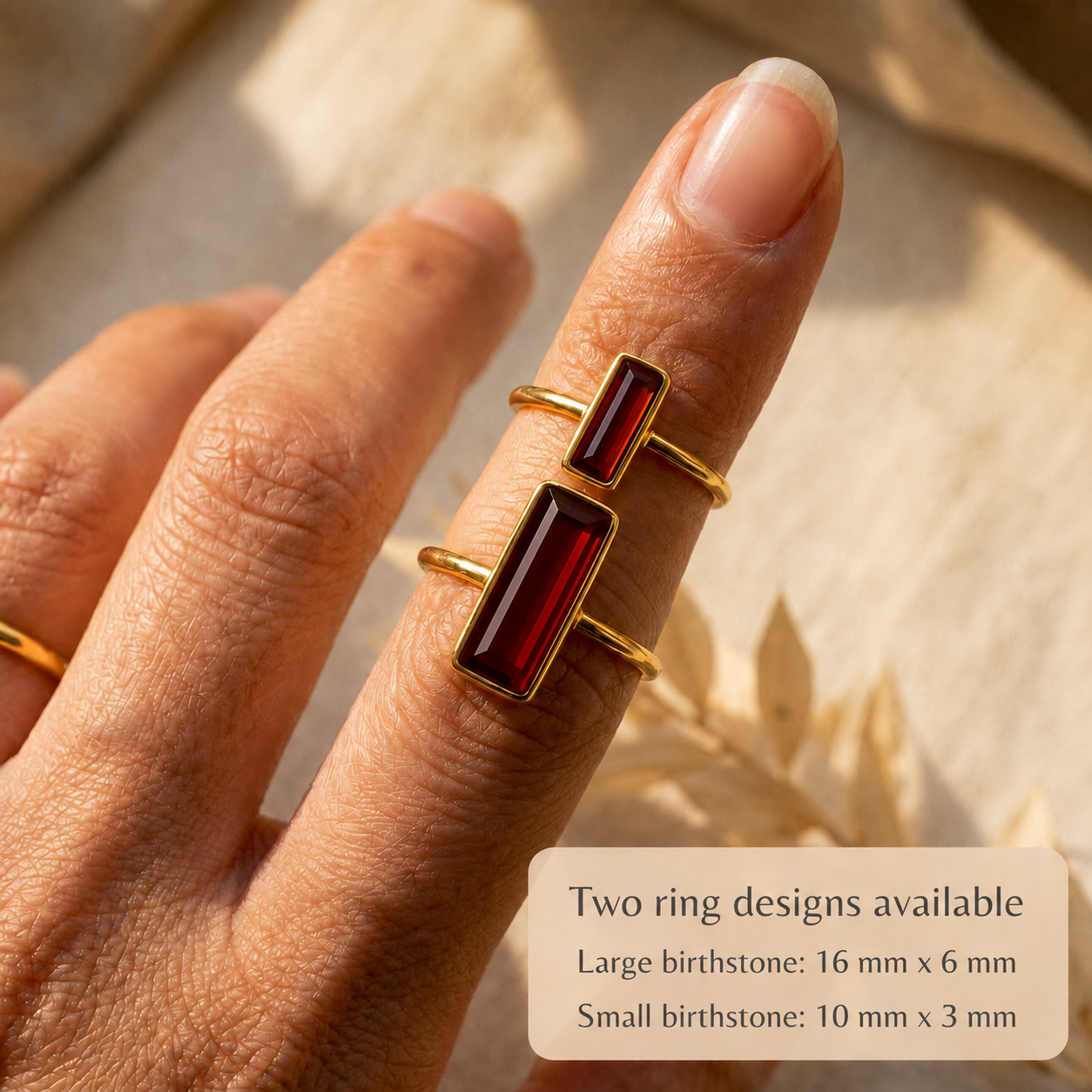 Large 16 x 6 mm and small 10 x 3 mm garnet baguette rings shown on hand