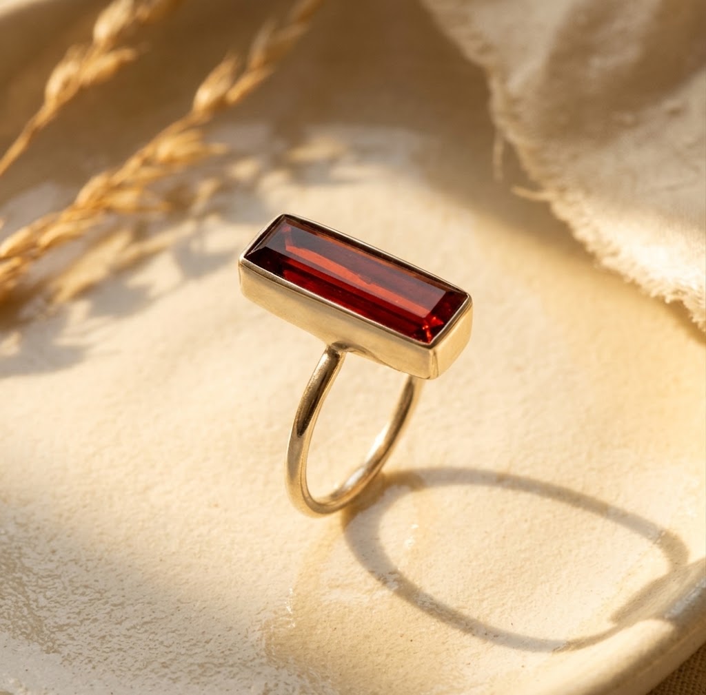 Vertical bezel set garnet bar ring in sterling silver
