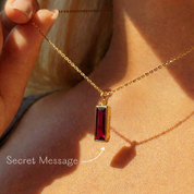 Garnet bar necklace in gold with vertical red gemstone pendant, January birthstone jewelry