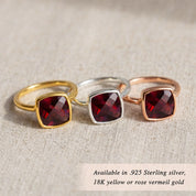 Woman wearing garnet cushion gemstone ring in gold – elegant everyday fine jewelry