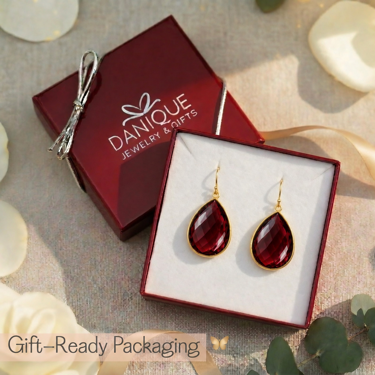 Garnet birthstone earrings in Danique Jewelry gift box
