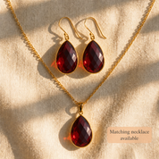 Large garnet teardrop earrings with matching garnet necklace

