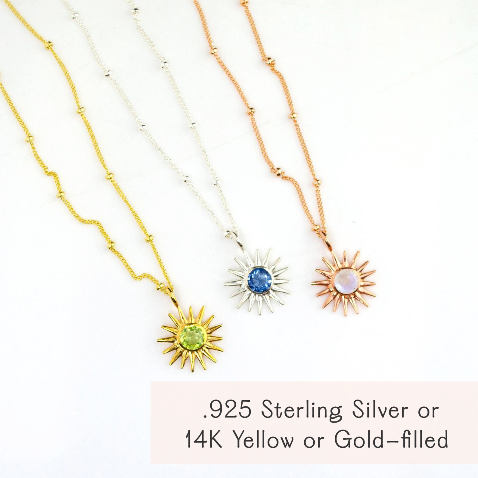 Gold, rose gold, and sterling silver sunburst pendant necklaces with aquamarine, opal, and garnet birthstones. Perfect zodiac, celestial, or bridesmaid jewelry gifts.
