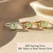 Green amethyst oval bezel set ring shown in sterling silver and gold vermeil, February birthstone gemstone ring comparison, minimalist stackable rings in multiple metal finishes