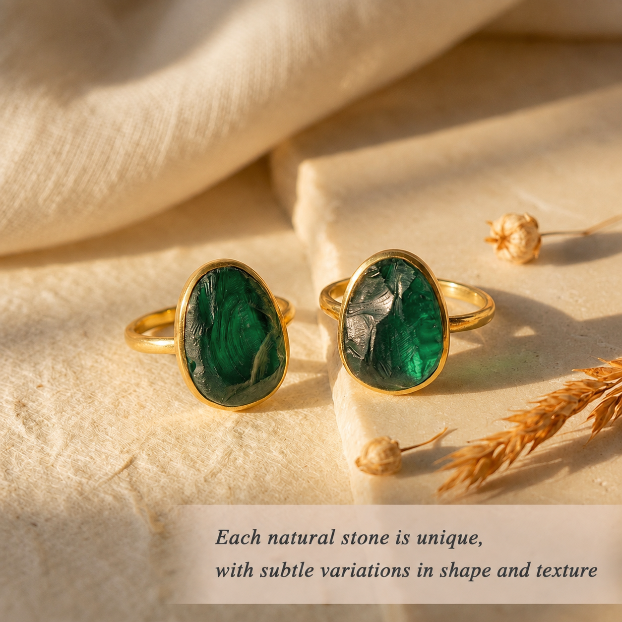 Two rough green tourmaline rings showing natural differences in gemstone shape, texture, and color.