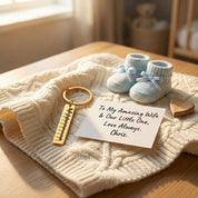 Hands holding ultrasound photo next to engraved heartbeat keychain, showing transformation from baby ultrasound to soundwave engraving. Personalized pregnancy gift and baby heartbeat keepsake for mom-to-be.