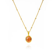 Oval Sunstone Cabochon Bezel Set into a 925 Sterling Silver Pendant Plated in 18k Vermeil Gold sitting on a 14K Gold Filled Satellite Chain against a white background. Shimmering Golden Orange Sunstone Necklace, Dainty Gold Gemstone Necklace,