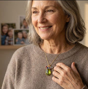 Grandma wearing custom family birthstone necklace with large center stone and kids charms