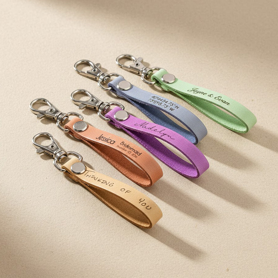 Custom engraved natural leather keychains in multiple colors with personalized names and coordinates, minimalist leather key fob gifts for couples, groomsmen, bridesmaids, Valentine’s Day, anniversary, and everyday use