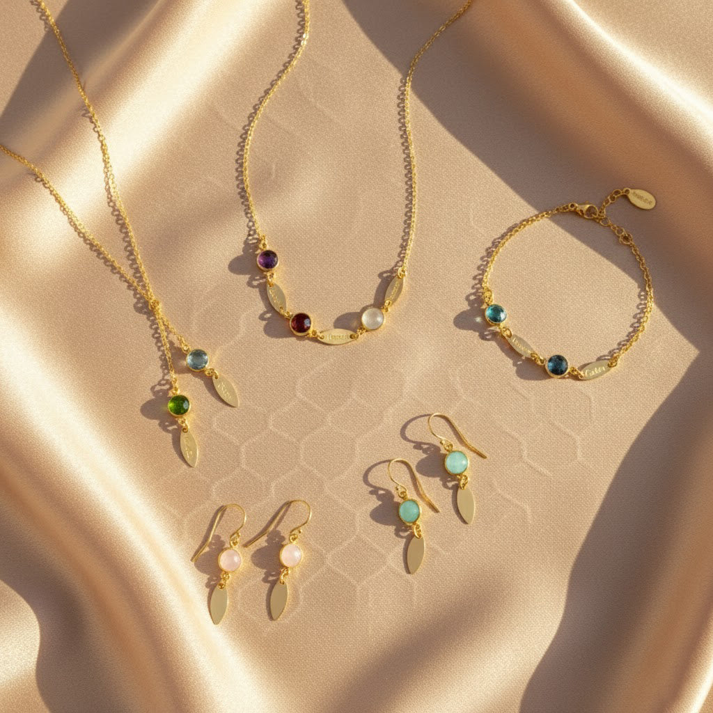 Lifestyle flat lay of personalized birthstone bracelet collection with engraved name tags, matching jewelry set for mom and bridesmaids