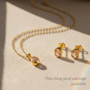 Oval Morganite birthstone bezel pendant necklace displayed alongside matching birthstone stud earrings, highlighting coordinated jewelry options. Minimalist birthstone jewelry set designed for everyday wear or gifting. Personalized gemstone necklace and earrings make a thoughtful gift for her, ideal for Valentine’s Day, birthdays, or special occasions.