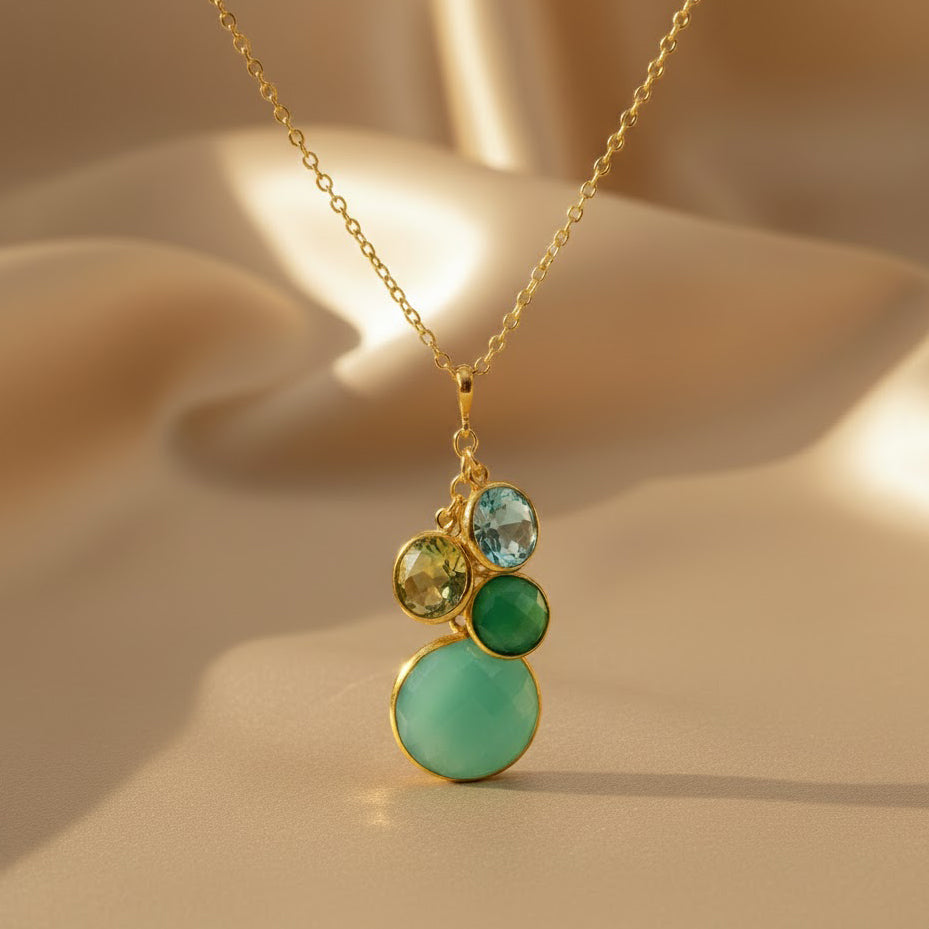 Custom mother’s birthstone necklace with gold chain and multiple bezel-set gemstones, including Aquamarine (March), Peridot (August), and Turquoise (December). Personalized family necklace for moms, grandmothers, or new mothers, available in sterling silver, gold filled, or rose gold filled. A meaningful jewelry gift for birthdays, Christmas, anniversaries, or Mother’s Day.