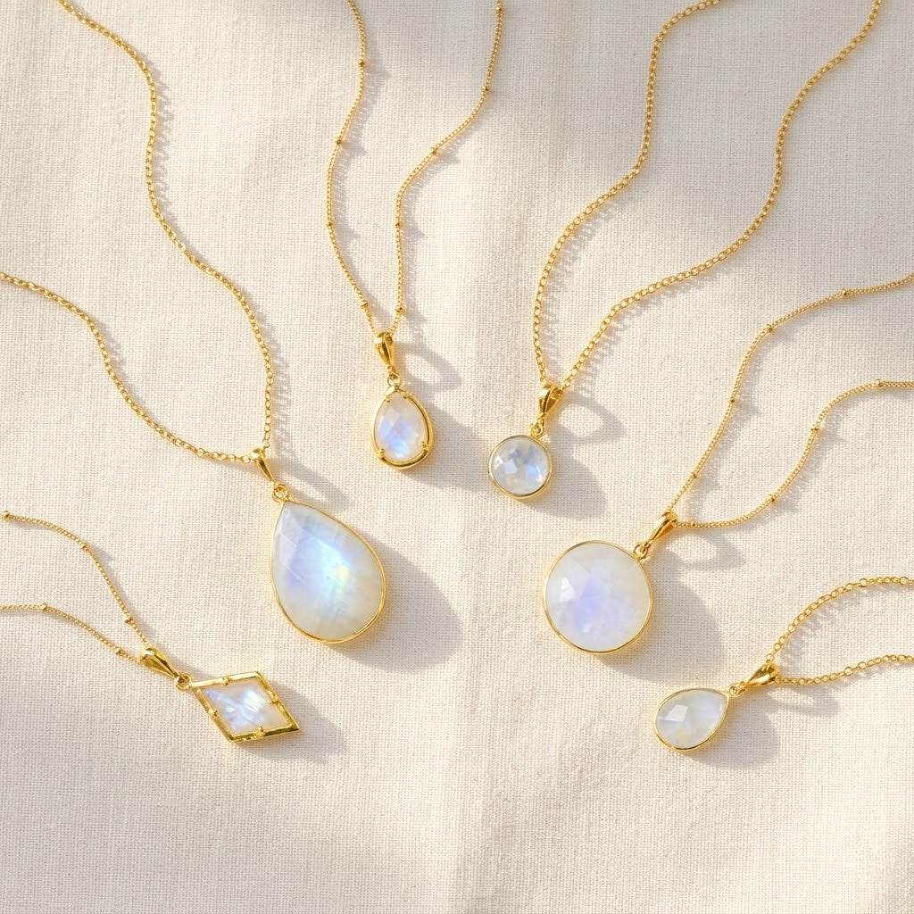 Moonstone necklaces in gold with teardrop, oval, round and geometric pendants, elegant June birthstone jewelry collection for women
