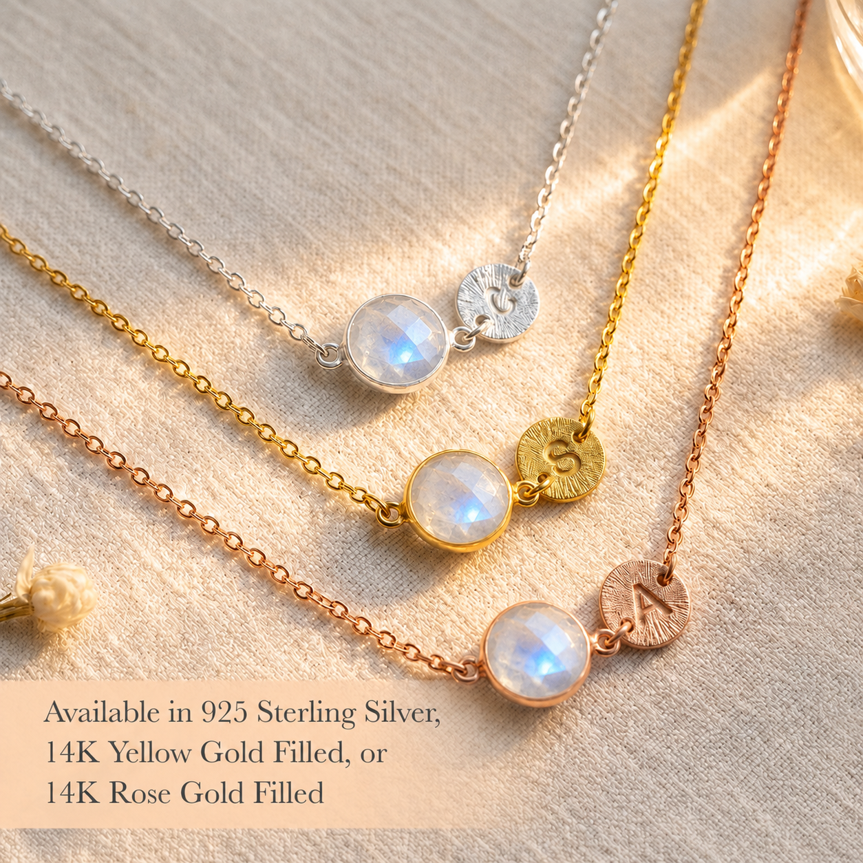Moonstone initial necklaces in sterling silver, yellow gold, and rose gold finishes with personalized disc charms.