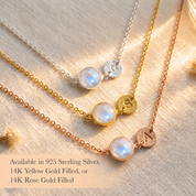 Moonstone initial necklaces in sterling silver, yellow gold, and rose gold finishes with personalized disc charms.