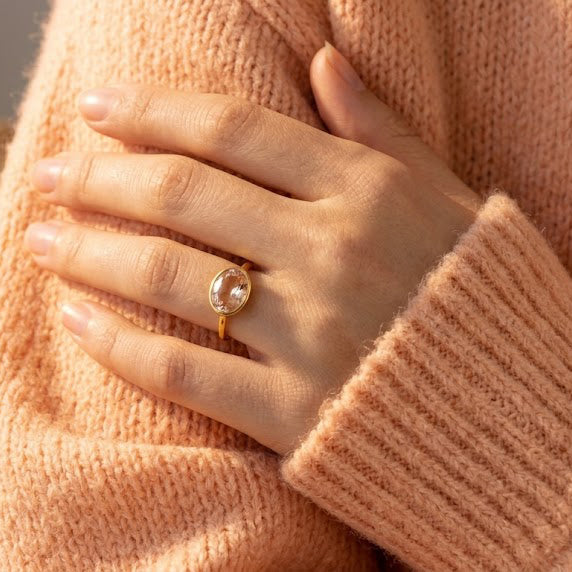 Morganite ring worn on hand, dainty oval bezel pink gemstone stacking ring for women