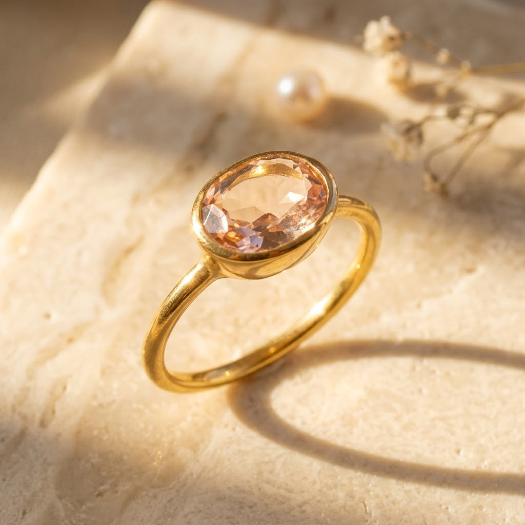 Oval morganite bezel set ring in gold, minimalist pink gemstone engagement style ring