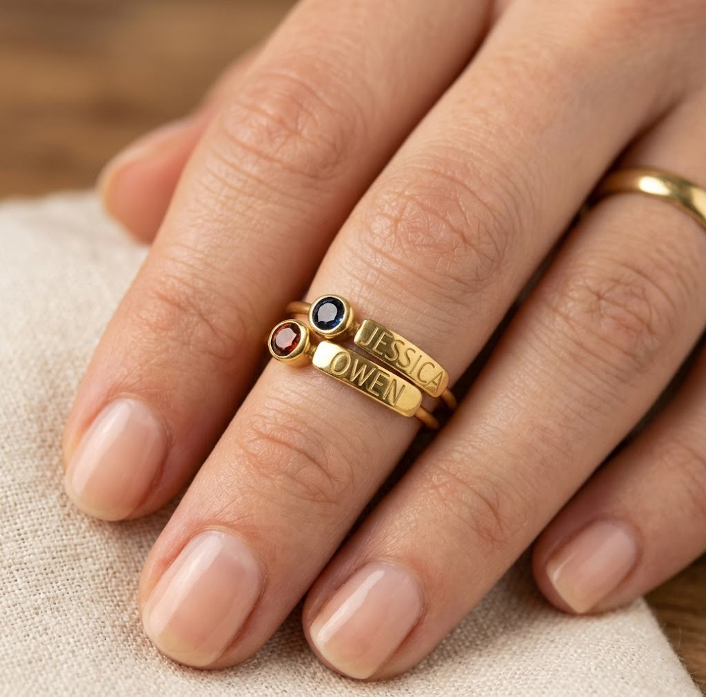 personalized stackable birthstone rings on hand, custom name engraved rings for mom, dainty gold stacking rings with gemstones