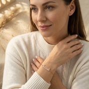 woman wearing custom name bracelet delicate personalized bracelet everyday jewelry gift
