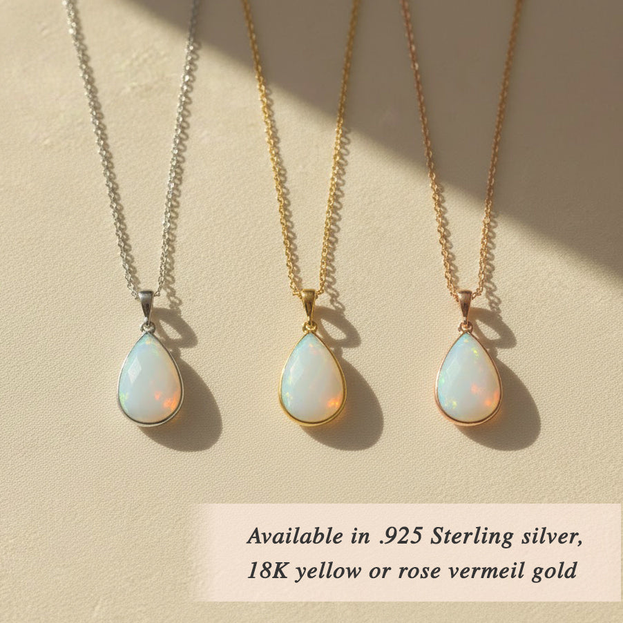 Three opalite teardrop necklaces in silver and gold tones on linen, iridescent opal-look stones, minimalist matching set idea for bridesmaids, sisters, or best friends.