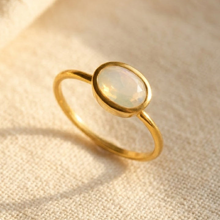 Faceted opalite ring in gold bezel setting minimalist October birthstone ring