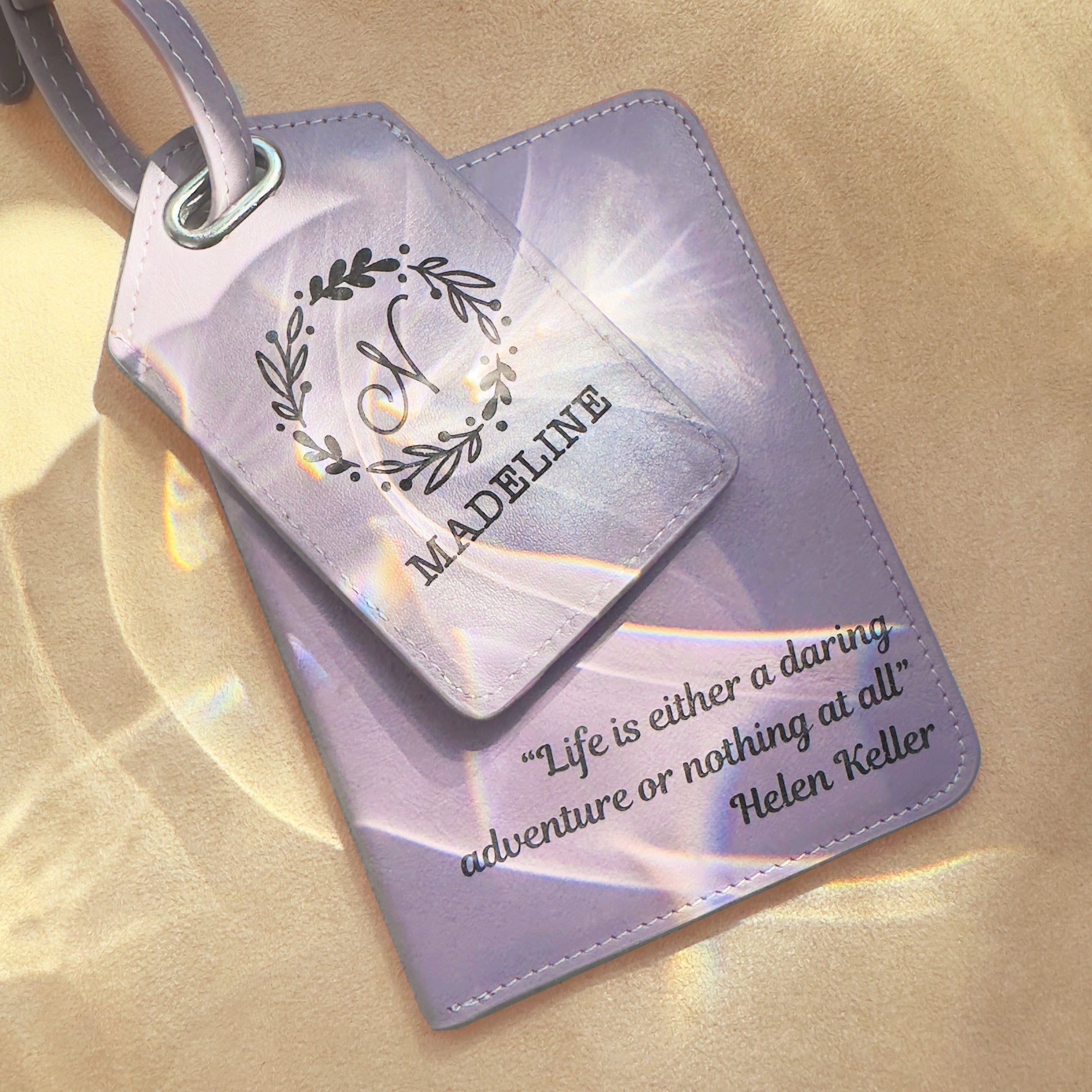 Lavender leather passport holder and matching luggage tag personalized with engraved monogram and name, plus inspirational Helen Keller travel quote. This custom travel accessory set makes a meaningful gift for her, combining elegance with practicality. Perfect as a graduation gift, best friend travel present, or anniversary keepsake, this engraved leather passport cover and luggage tag help celebrate wanderlust in style. A thoughtful personalized travel gift for women who love adventure.