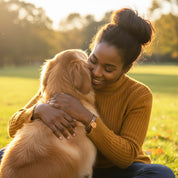 Personalized pet bangle bracelet worn by a woman hugging her dog, highlighting engraved paw print and custom pet name on a polished disc charm. Perfect meaningful jewelry gift for dog moms, pet lovers, or anyone wanting a sentimental keepsake. Adjustable wire bangle crafted in sterling silver, gold, or rose gold. Ideal for birthdays, holidays, Mother’s Day, and memorial pet gifts, offering heartfelt symbolism and everyday wear comfort.