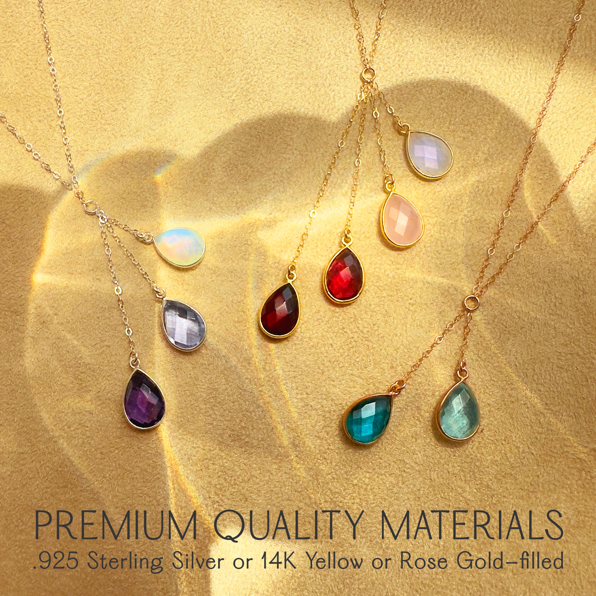 Premium quality, hypoallergenic jewelry photo showing pear-shaped birthstone pendants in mixed metals: nickel-free .925 sterling silver, 14k yellow gold-filled, and 14k rose gold-filled. Faceted teardrop gemstones—opalite, iolite blue, amethyst purple, deep garnet, blush rose quartz, and aqua teal—are bezel-set for a sleek, modern look. Perfect for color-pop layering, minimalist fine jewelry lovers, and women’s gift ideas for birthdays, anniversaries, or everyday Y-necklace styling.