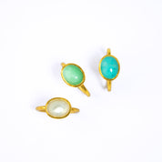 Three Gold Large Oval Statement Rings Bezel Set with Mother of Pearl, Mint Green Chrysoprase, and Teal Amazonite Cabochon Gemstones on a white background. Summer Jewelry, Summer Stacking Rings, Beach Rings, Ocean Jewelry, Summer Birthday Gift