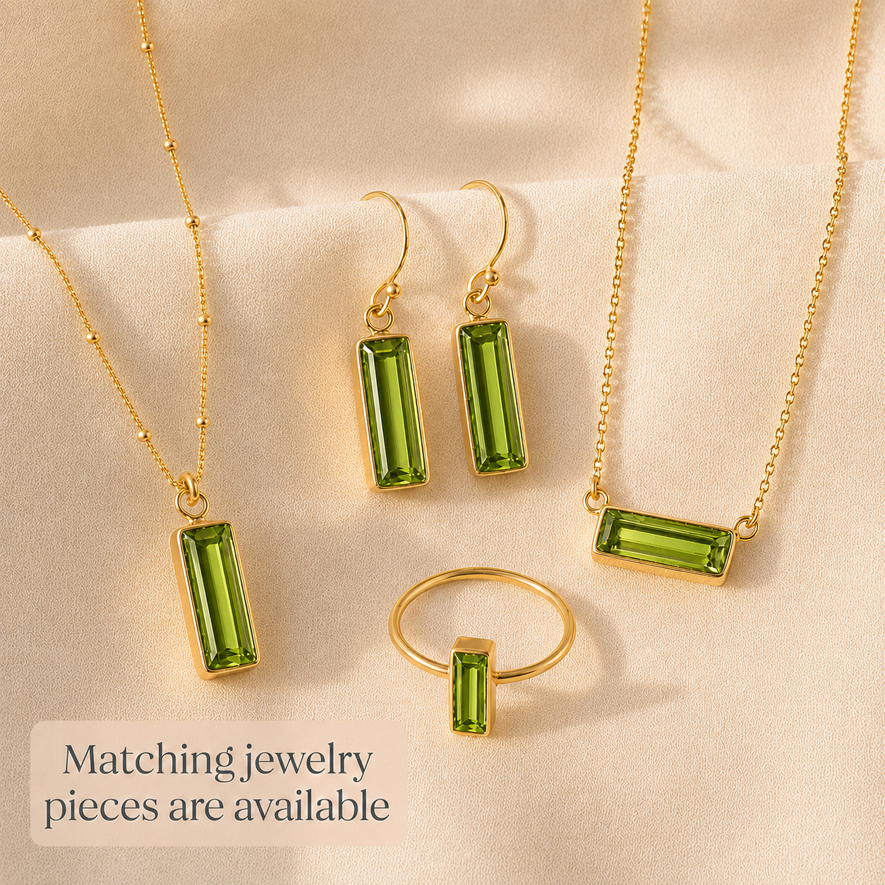 Matching Adira peridot earrings, necklace and ring in gold