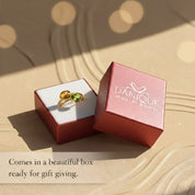 Peridot and citrine oval gemstone ring displayed in a Danique Jewelry gift box, elegant birthstone ring presented in blush pink packaging, ready for gift giving for birthdays, anniversaries, Valentine’s Day, or August and November birthstone jewelry lovers.