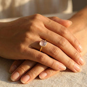 Cushion cut birthstone ring collection including pink chalcedony October ring, gold gemstone jewelry in multiple colors