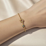 Custom Birthstone Bloom charms collection. Personalized bracelets, necklaces and earrings for moms and BFF. Minimalistic handmade jewelry ready for gift giving.