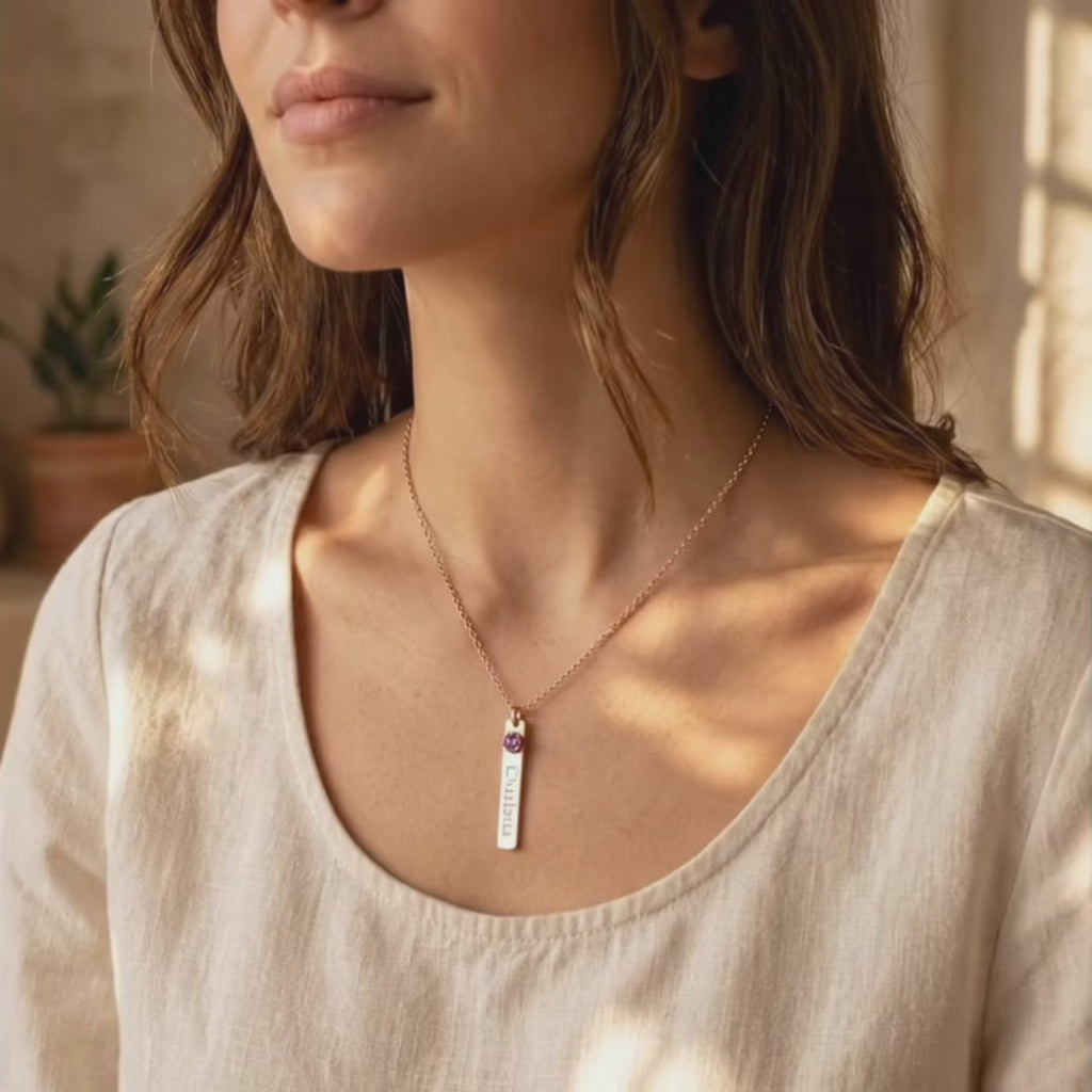 A video showcasing mom necklace with engraved name bar charm necklace with birthstones. Comes in rose gold, yellow gold, or in sterling silver.