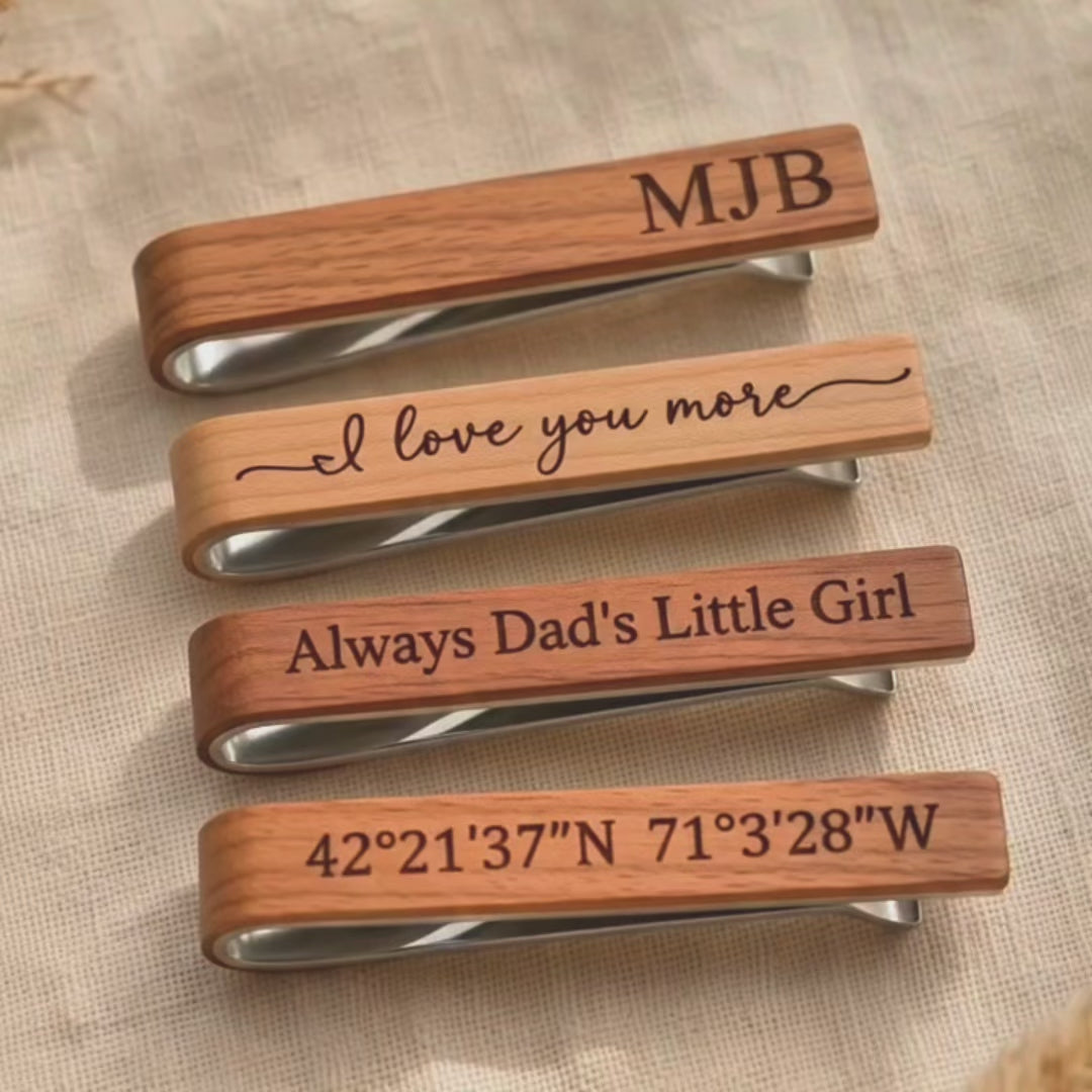 A video showcasing custom engraved wooden tie clip. Woods include mahogany, walnut, cedar, ebony, and afromosia. Perfect personalized gift for groom, groomsmen, best man, Father’s Day, 5th anniversary, graduation, or retirement. 