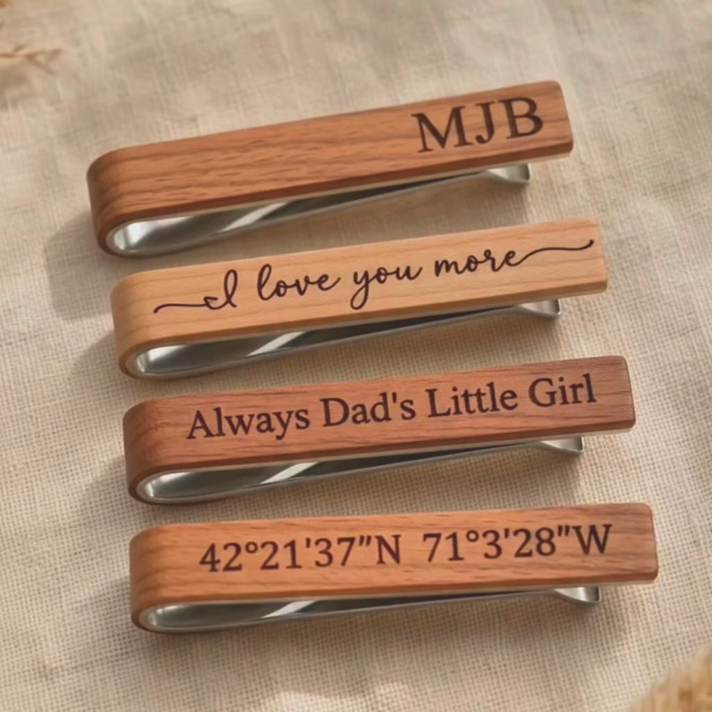 A video showcasing custom engraved wooden tie clip. Woods include mahogany, walnut, cedar, ebony, and afromosia. Perfect personalized gift for groom, groomsmen, best man, Father’s Day, 5th anniversary, graduation, or retirement. 