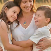 A video showcasing Personalized birthstone necklace for mom with teardrop gemstone charms and engraved names, a meaningful custom family necklace for mothers or grandmothers.